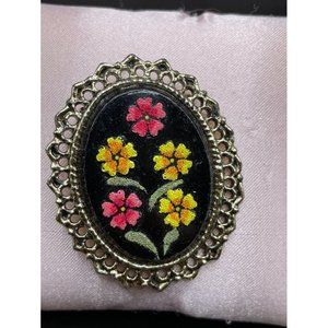 Gold Tone Floral Center Black Background Flower Felt Like Appearance Length 2 in